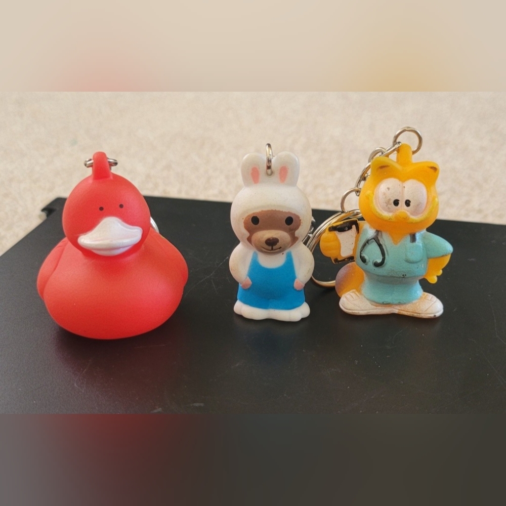 Star awards bear in bunny outfit, Dr. / Nurse Garfield  & red duck Keychain.